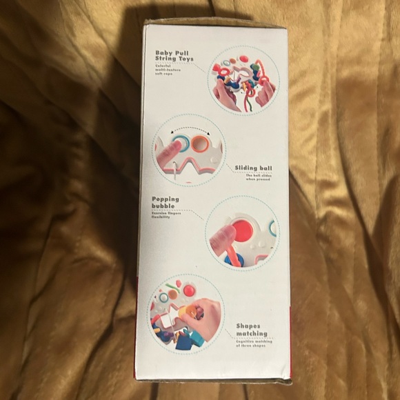 Baby👶🏻Pull String Pumping Teether Sensory Tummy Time & Fine Motor Skills Toy - Picture 7 of 11